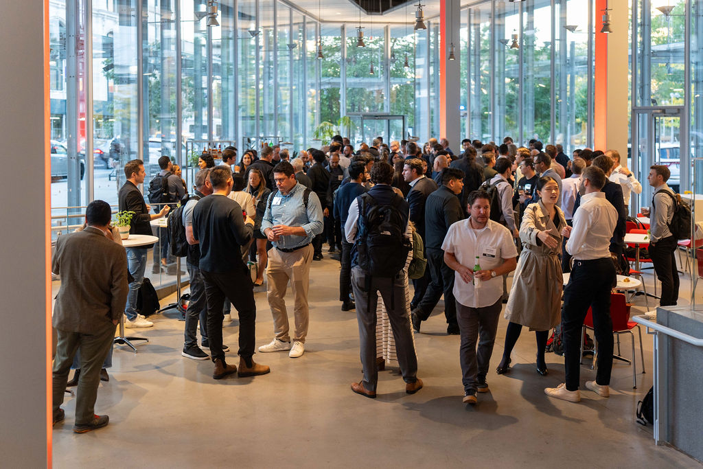 Attendees networking in the lobby at Fintech Demo Day 2025